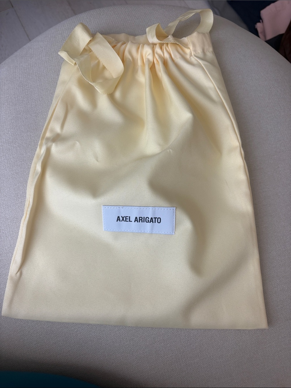 Axel Arigato Pale Yellow Drawstring Shoe Bag